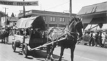 Replica covered wagon in the Strawberry Festival parade Kalama Washington circa 1939-1951